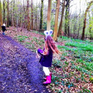 children playing  in woods