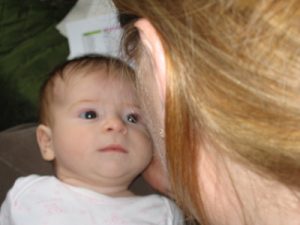 Baby looking at mum